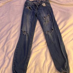 Refuge, ripped blue jeans